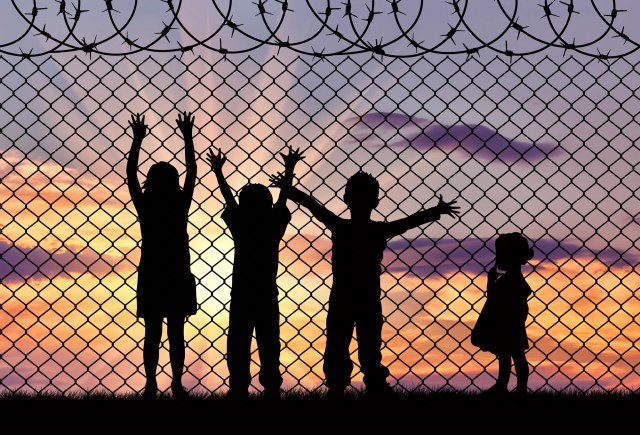 Silhouette of the hungry children of refugees