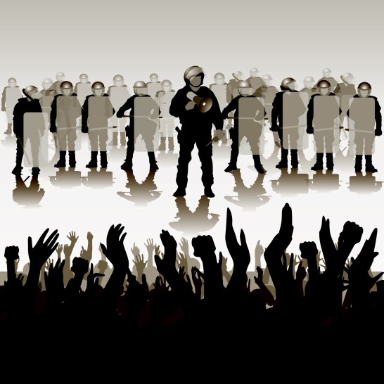 Protesters crowd and police